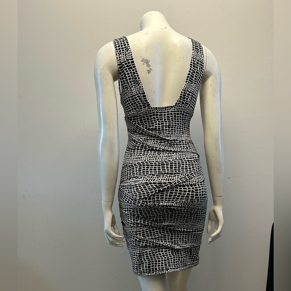 LUSH flattering low vneck fitted dresss. Stretch cinched material. Pit-pit-15” - Picture 8 of 9